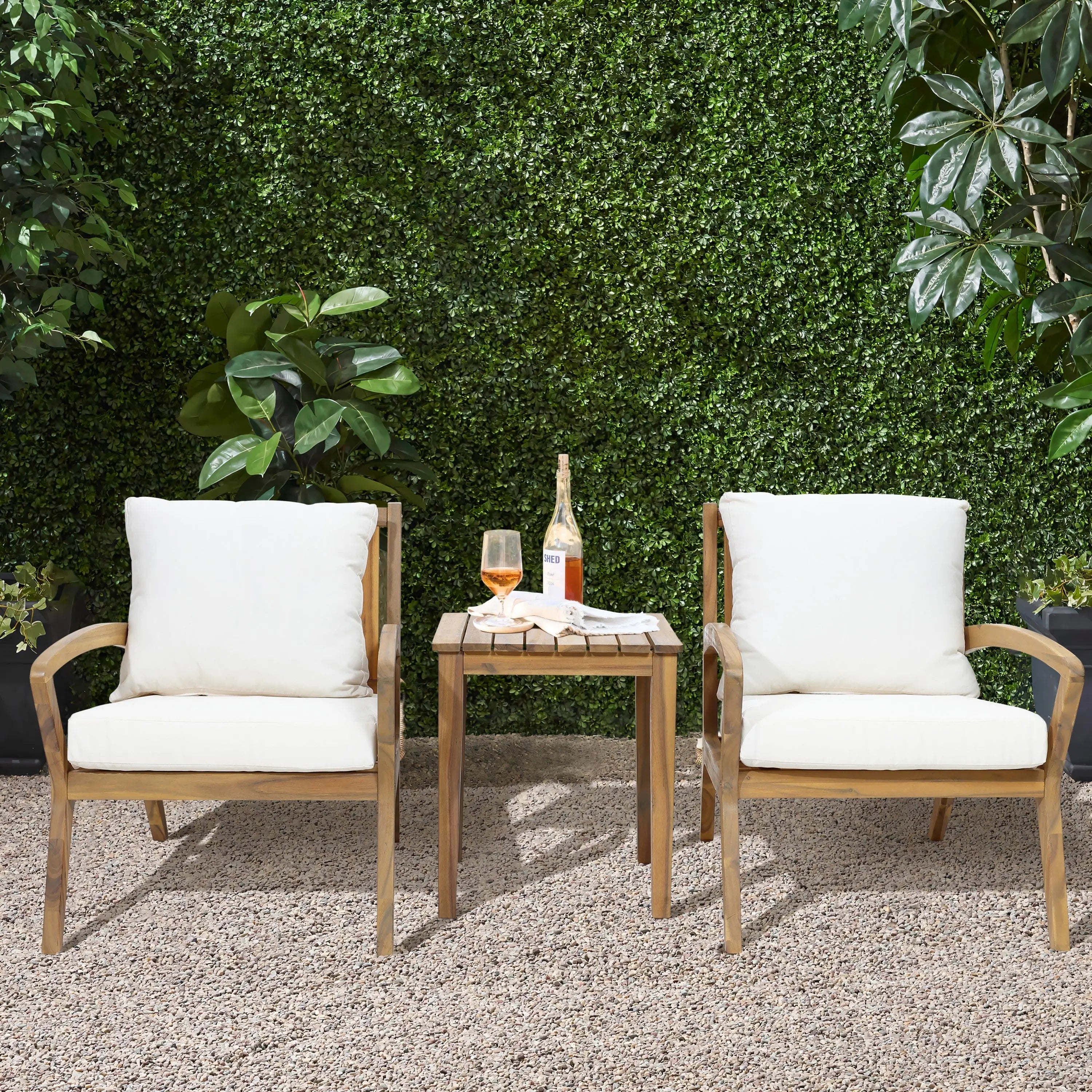 two-chairs-and-a-table-in-a-garden-setting