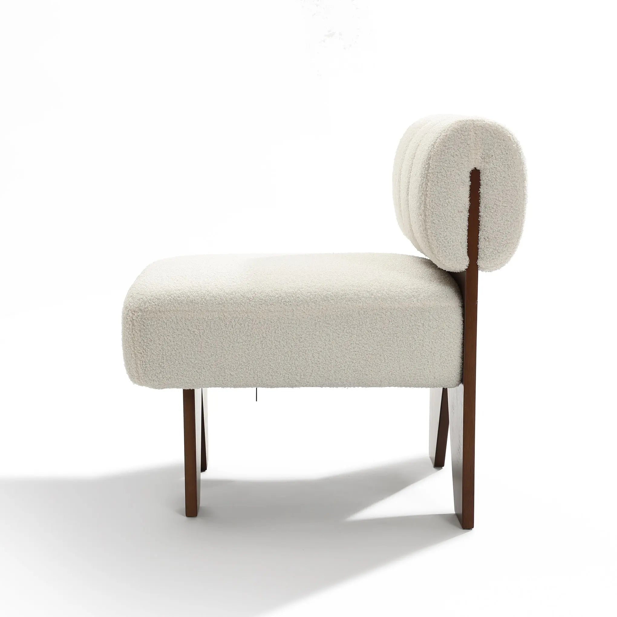 The LuxenHome Lorenzo boucle upholstered wood frame armless accent chair features a white, textured cushion seat and semicircular backrest. With four wooden legs, it exudes mid-century allure in a minimalist design against a plain white background.
