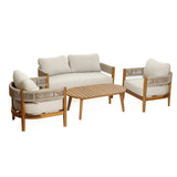 A set of club-style patio furniture featuring an outdoor acacia wood coffee table, a three-seat sofa, and two armchairs with beige cushions—all elegantly arranged on a white background.
