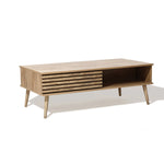 This wooden coffee table boasts angled legs and a slatted front, enhanced by dual-side storage and an open compartment for convenience.