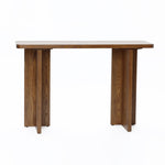 A brown wooden console table with a rectangular top and two sturdy, flat-panel legs on each side embodies minimalist design with a mid-century modern flair.