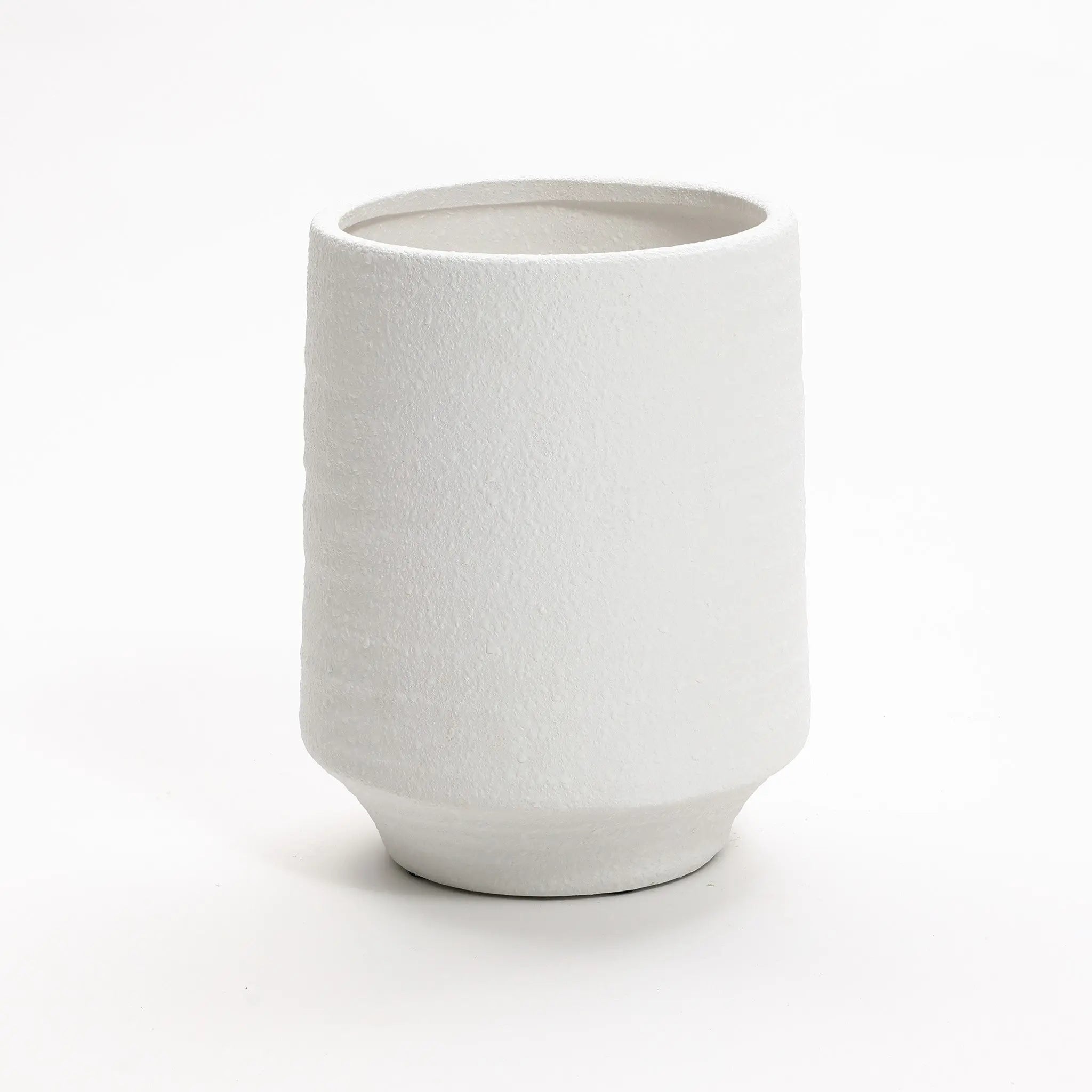 A white terracotta vase with a textured ceramic finish features a cylindrical shape and slightly tapered base, standing at 12 inches tall. Ideal for both indoor and outdoor settings, its beautifully displayed against a plain white background.