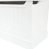 A close-up view of a white wooden storage bench with a paneled front and a slightly open lid.