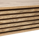 Close-up of a wooden surface with horizontal slats, reminiscent of a coffee tables natural grain and texture.