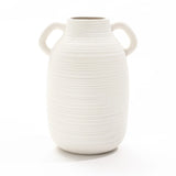 White ceramic vase with a textured surface and two side handles, exuding rustic charm, set against a plain white background.