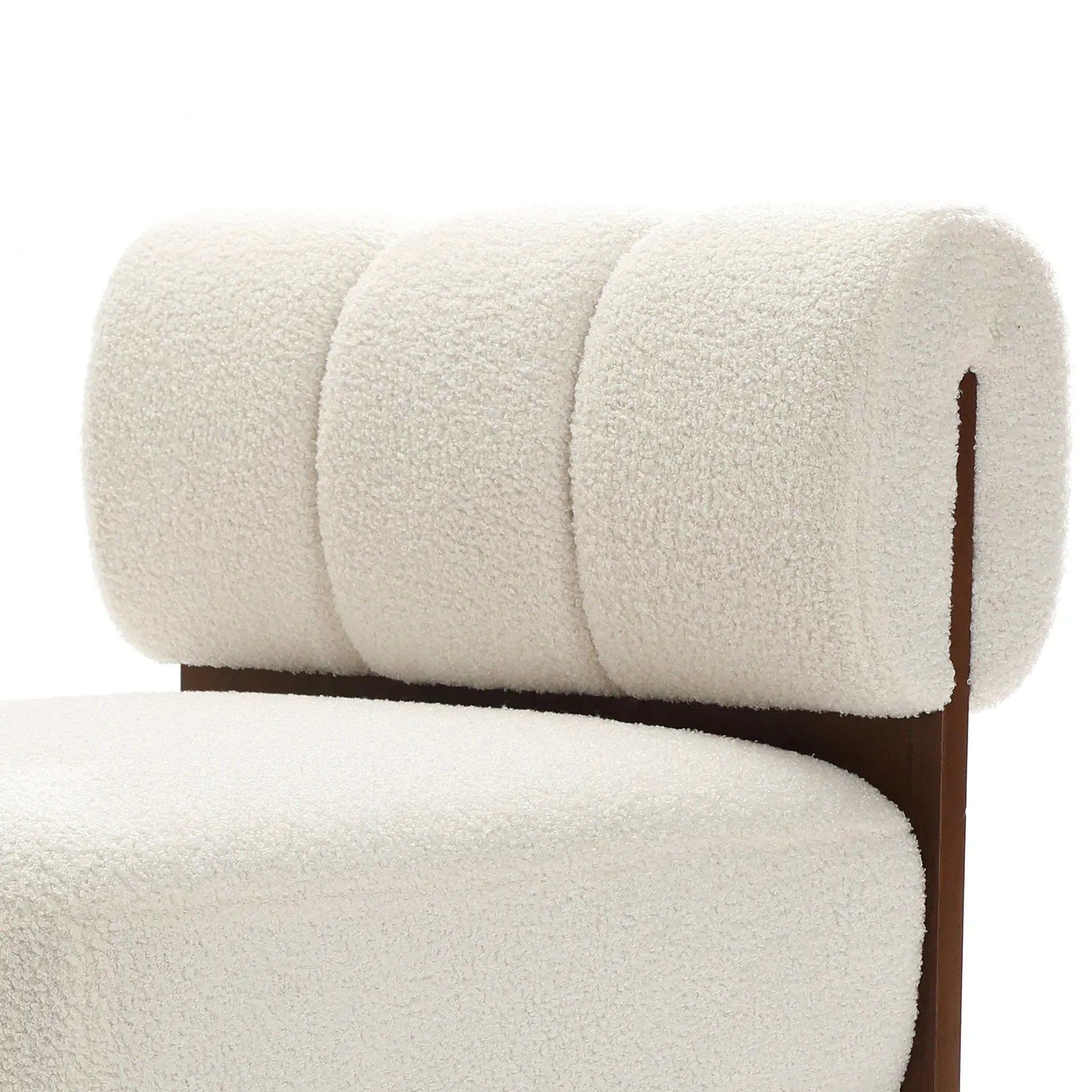 The LuxenHome Lorenzo Boucle Armless Accent Chair features a rolled, plush backrest, textured white upholstery, and high-density foam for comfort. Its partly visible wooden frame enhances the mid-century allure and contemporary design.