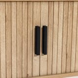 Wooden cabinet doors with vertical grooves and two black handles, perfectly complementing an oak TV stand designed to accommodate a 65-inch TV.