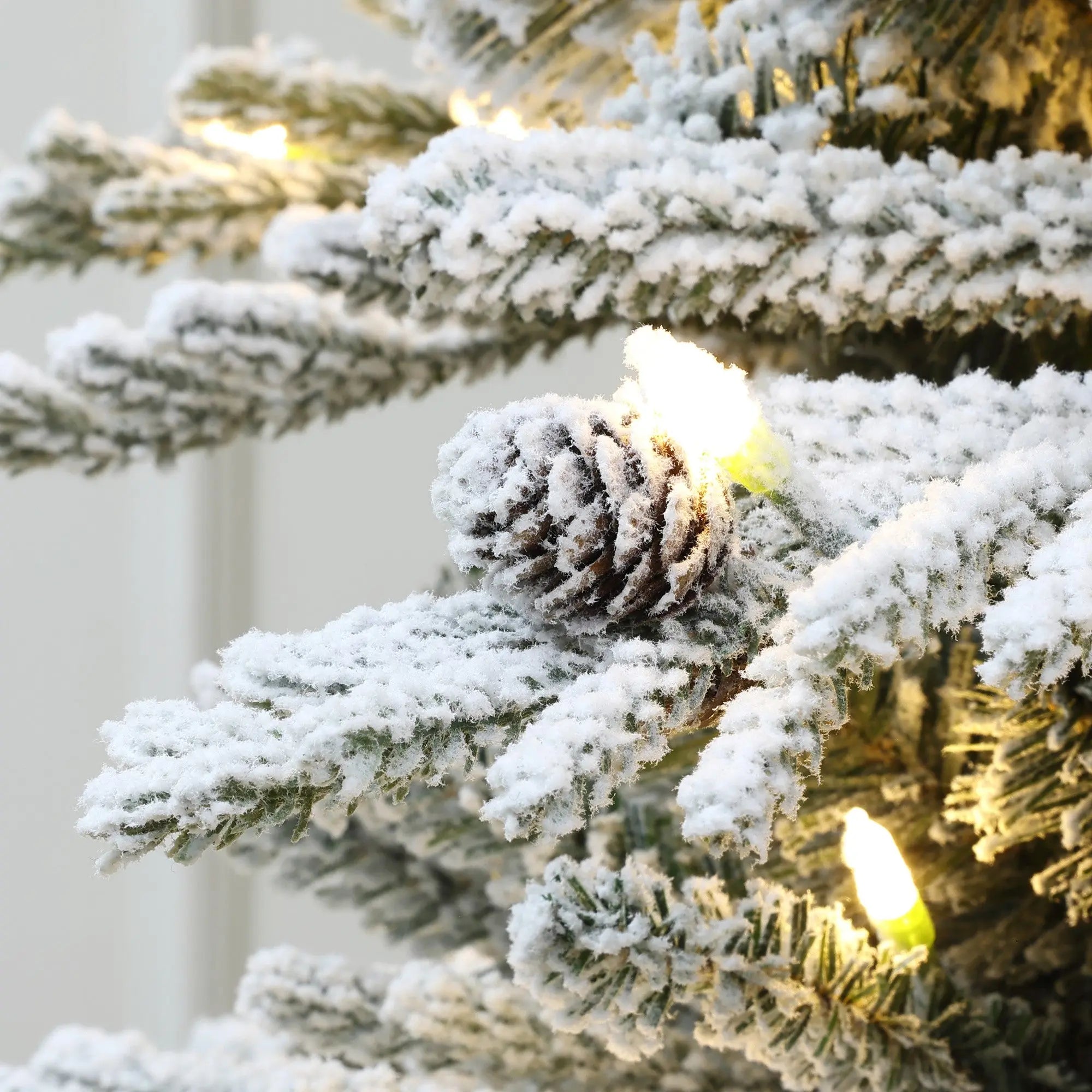 7.5ft-pre-lit-flocked-artificial-christmas-tree-with-pine-cones