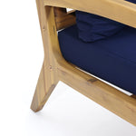 chair-with-a-blue-cushion-and-a-wooden-frame
