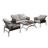 Outdoor seating set with a black metal frame and removable waterproof cushions, featuring a sofa, two chairs, and a rectangular glass-top table adorned with a tray of glasses.