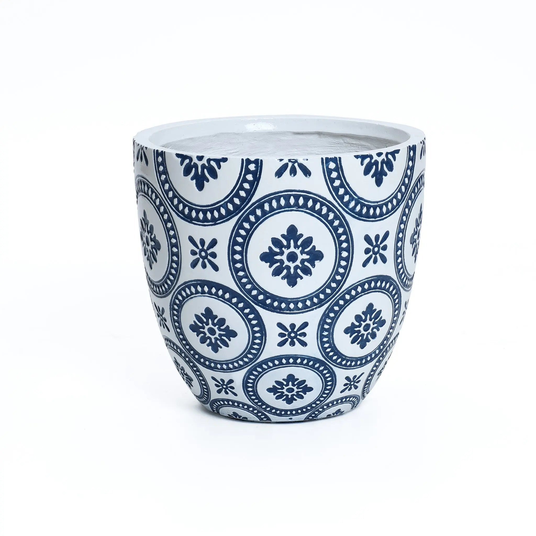 A modern ceramic pot with a blue circular pattern featuring floral designs, crafted from durable MgO material and placed against a plain white background. This stylish planter includes a convenient drainage hole to keep plants healthy.