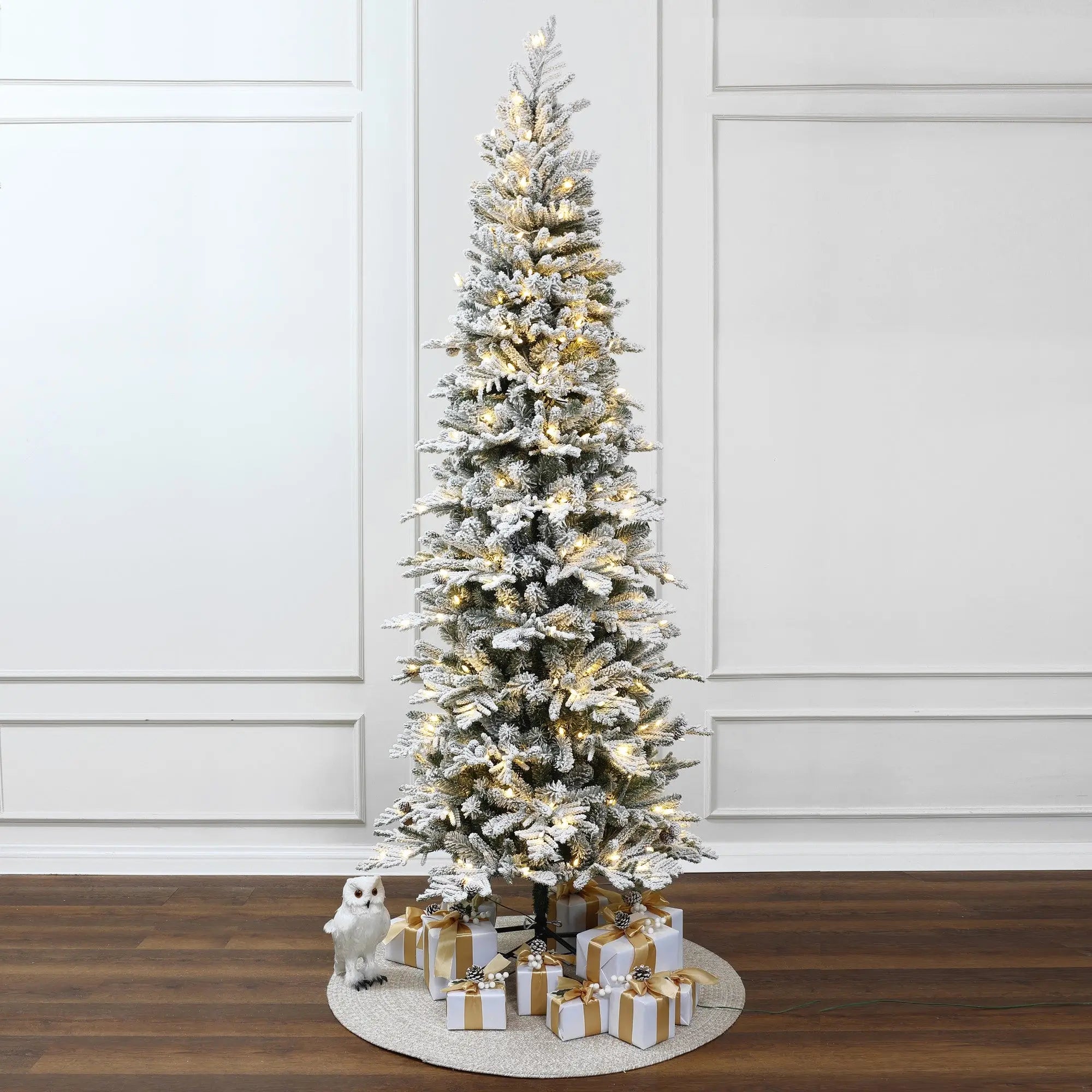 create-a-winter-wonderland-indoors-with-this-slim-pre-lit-snow-flocked-christmas-tree