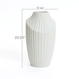 A white vase with a ribbed texture, resembling a modern abstract sculpture, stands elegantly against a plain background. Perfect as a decorative piece, its dimensions are marked: 20.28 inches tall and 11.14 inches wide, making it ideal for contemporary home decor.