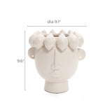 The LuxenHome White Ceramic Bust Head Vase, measuring 9.1 in diameter and 9.6 high, is a modern planter featuring textured hair with a minimalist design that emphasizes the facial features and intricate detailing.