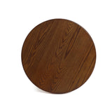 A mid-century modern side table with a round tabletop showcases its high-quality MDF wood and visible grain patterns, viewed from above against a pristine white background.