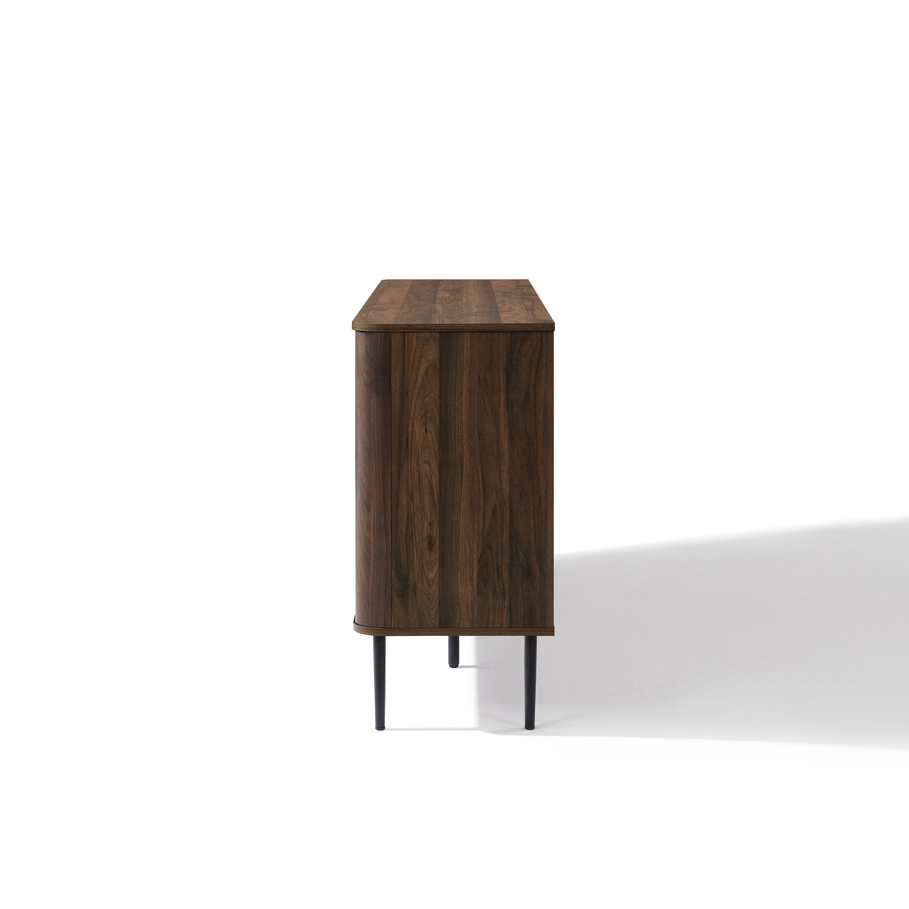 A mid-century modern sideboard cabinet with a dark finish and black metal legs.