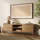 Modern wooden sideboard perfect as living room furniture, sits below abstract wall art.