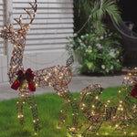 Holiday-Reindeer-pulling-a-sleigh-with-led-lights-red-bows-pinecones-perfect-for-outdoor-area
