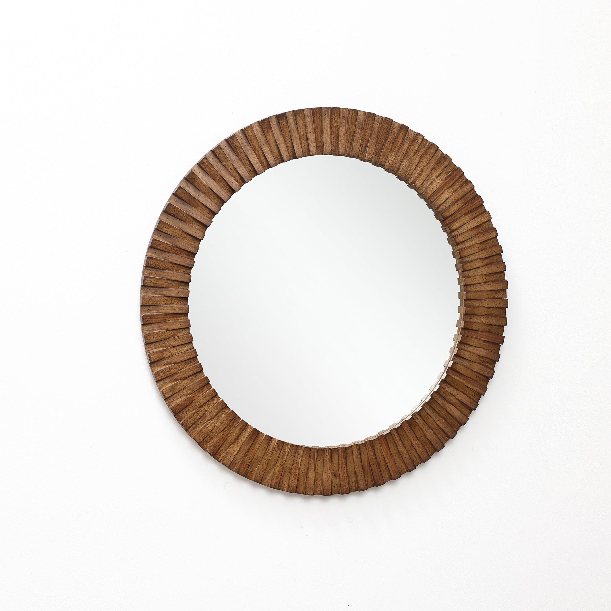 Round wall mirror with a wide, ridged oak wood frame, mounted on a plain white background.