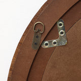 Close-up of the back, showing metal hanging hardware and brackets attached with screws.