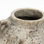 Close-up of a Terracotta Vase with a wide opening and weathered speckled surface, highlighting rustic farmhouse charm for home décor.