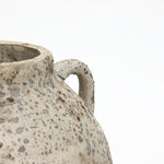 Close-up of a Terracotta Vase handle with weathered speckled texture, showcasing rustic farmhouse style against a plain white background.