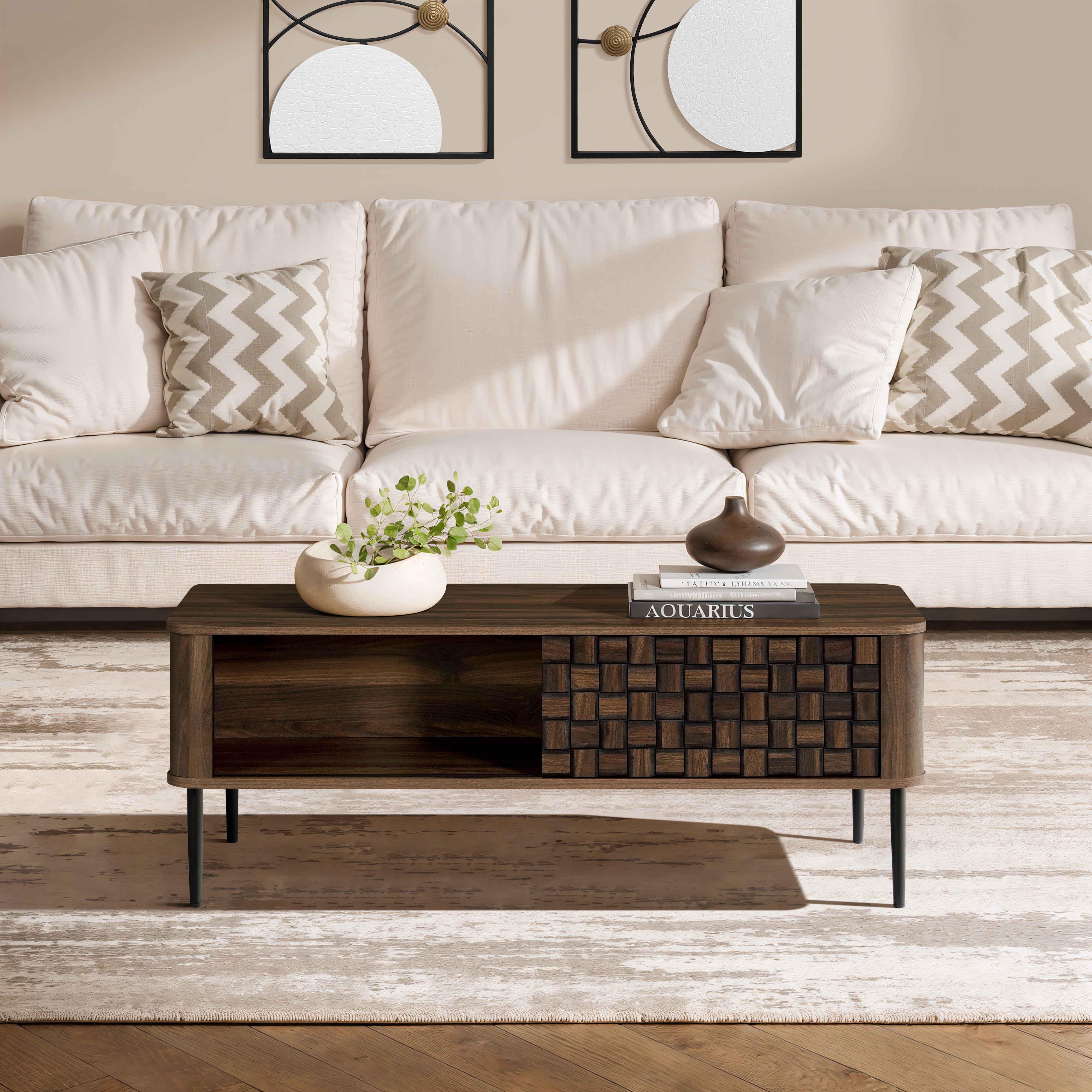 Modern living room with a mid-century modern wood coffee table with storage and decor.