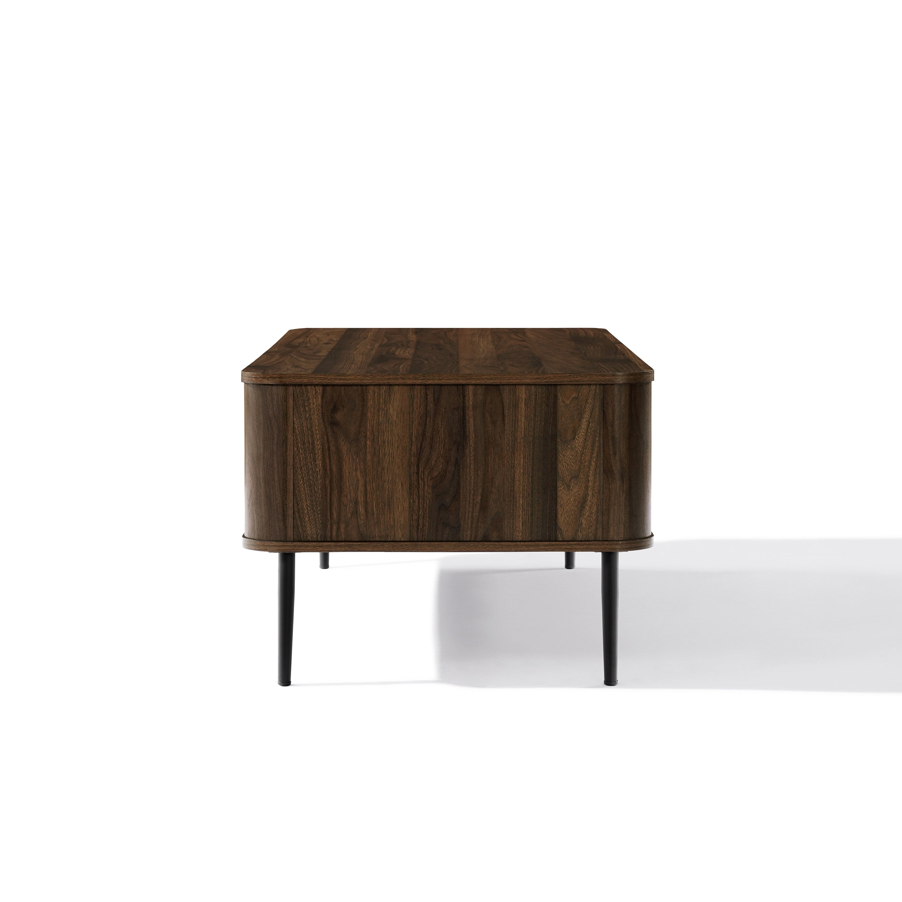 Rectangular wood coffee table with rounded edges and black metal legs, against a plain white background.