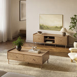 Living room with wood furniture, including a Japandi coffee table, sideboard, potted plants, a neutral rug.