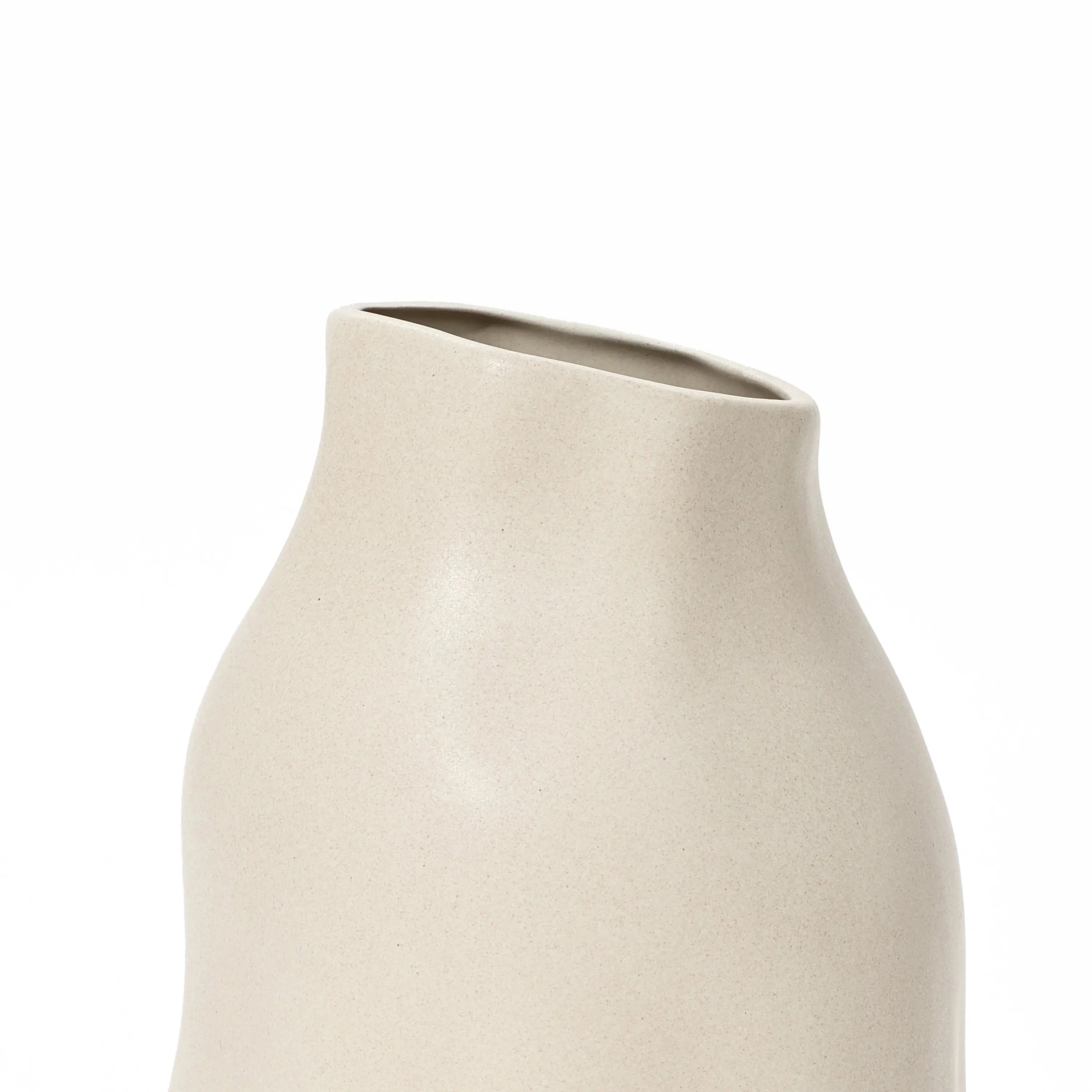 Ivory white ceramic vase with a smooth, minimalist design and an asymmetrical, angled opening, perfect as an accent piece.
