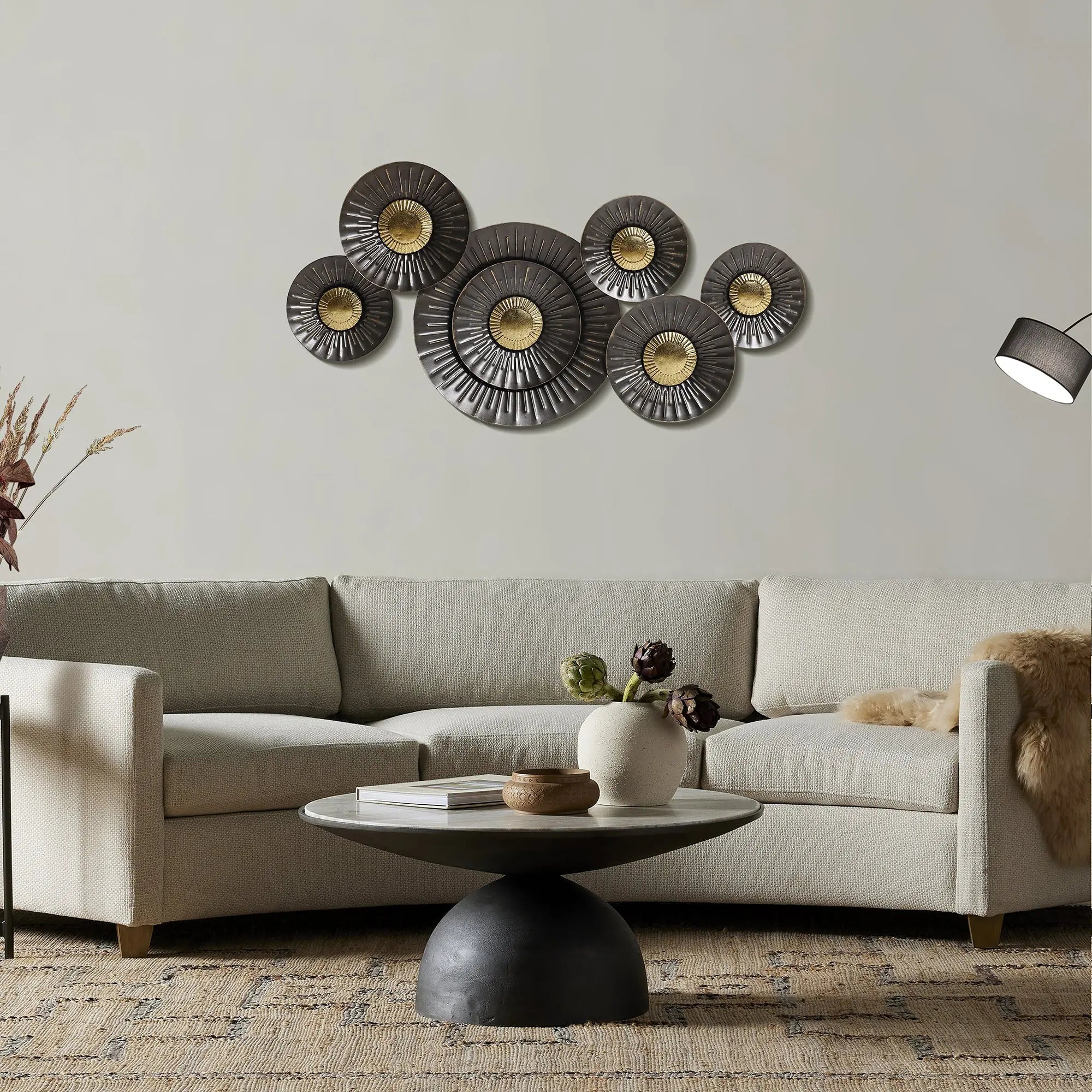 a-living-room-with-a-sofa-coffee-table-and-wall-art