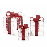 Three wireframe gift boxes of varying sizes with red glitter bows and ribbons, displayed against a white background—perfect as lighted gift boxes for festive decor.