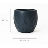 Introducing a black geometric pot planter crafted from durable magnesium oxide material. Standing at 13.2 inches tall with a 14.6-inch diameter, its perfect for both indoor and outdoor use, elegantly framed against a white background.