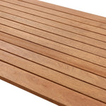 Close-up of a wooden surface with evenly spaced parallel slats, showcasing the rich texture of solid Malaysian hardwood.