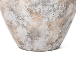 A close-up of the lower part of a large ceramic vase showcases a striking white and brown speckled pattern, reminiscent of white marble texture, against a plain white background. Perfect for enhancing any home decor setting with its elegant design.