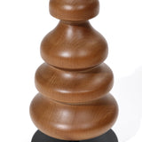 This exquisite wooden sculpture, crafted from smooth, rounded stacked layers of birch wood, rests elegantly on a black base. Perfect for home decor enthusiasts seeking a touch of natural sophistication.