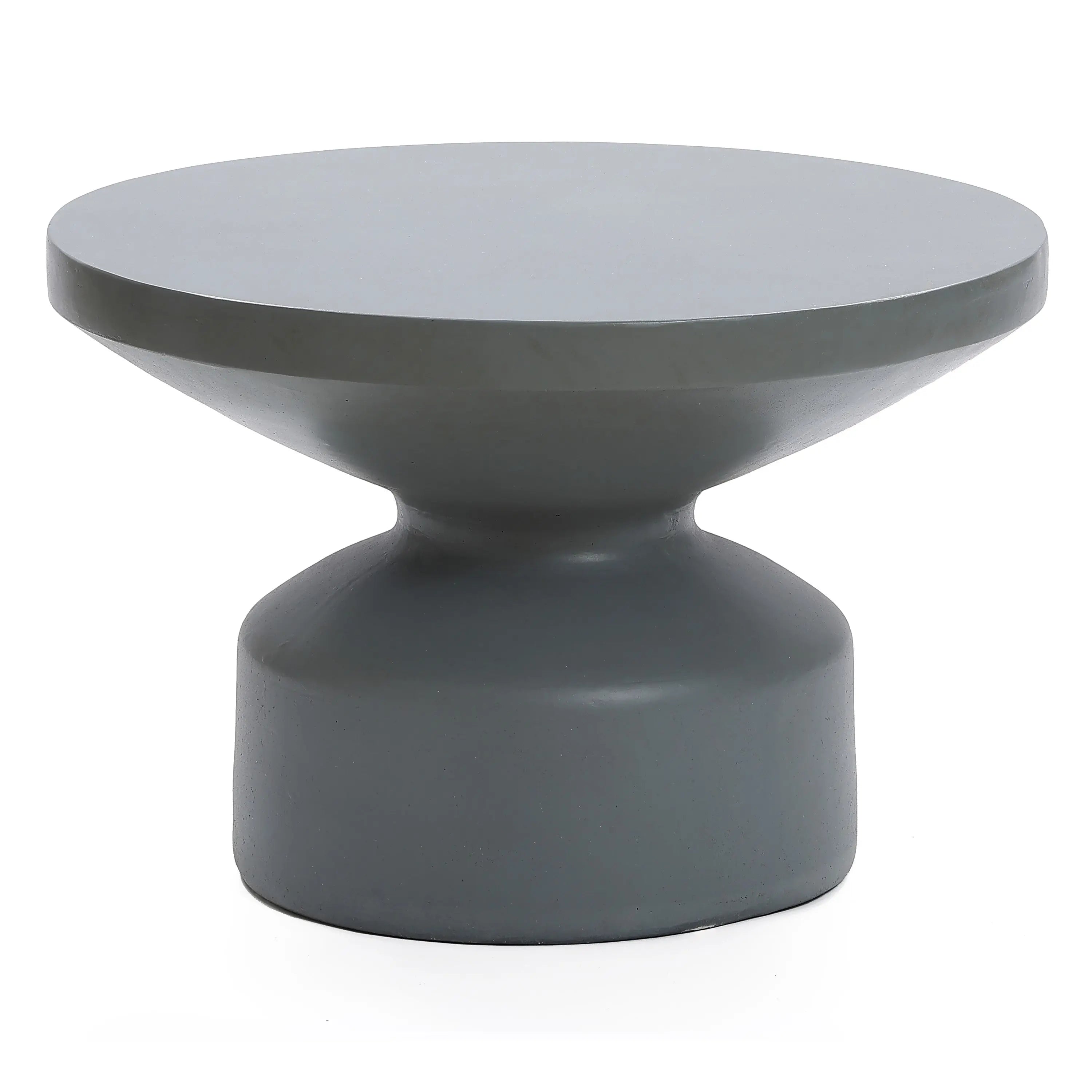 Contemporary round coffee table with a wide, flat top and tapered pedestal base, crafted from magnesium oxide material for a sleek minimalist design, set against a plain white background.