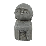 Gray stone Buddha monk statue of a smiling, small figure holding a round bowl in front of its body—perfect as a serene meditation centerpiece or charming garden statue.
