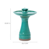Green ceramic bird bath with a pedestal base and an elegant lotus design, measuring 22.05 inches in height and 12.99 inches in diameter—a striking decorative garden piece that enhances any outdoor space.