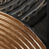 Close-up of embossed textures with curved patterns; one part is metallic bronze, the other black with gold brush strokes, creating an exquisite art piece perfect for wall decor.