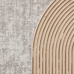 Close-up of a textured surface with a burlap pattern on the left and an arc of parallel wooden grooves on the right, creating a mesmerizing piece of abstract wall art.