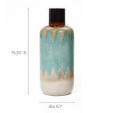 This coastal-inspired vase features a tall ceramic design with a zigzag pattern in blue and beige. Measuring 15.35 inches high and 6.1 inches in diameter, it adds nautical charm to any tabletop decor.
