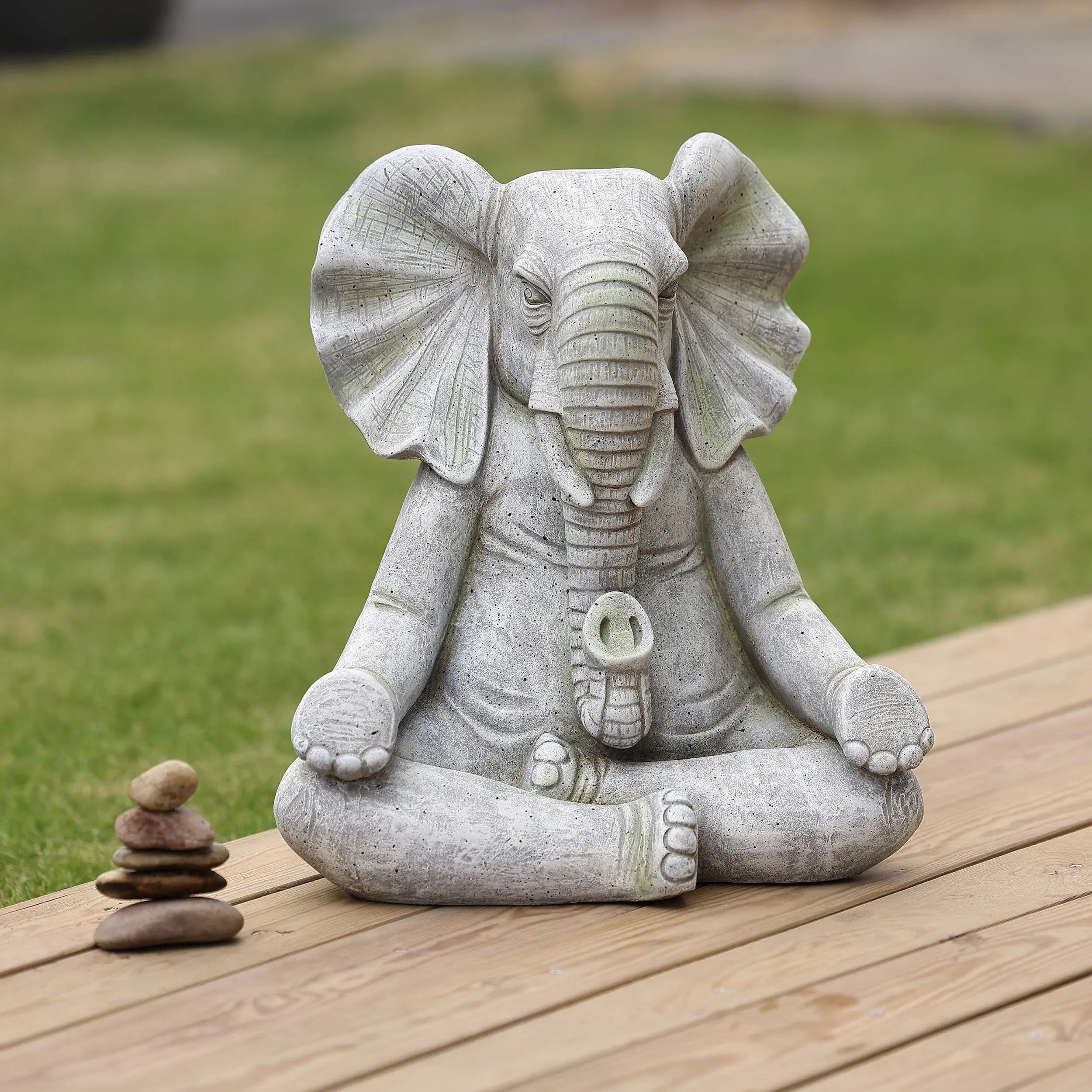 a-stone-elephant-and-a-pile-of-stones