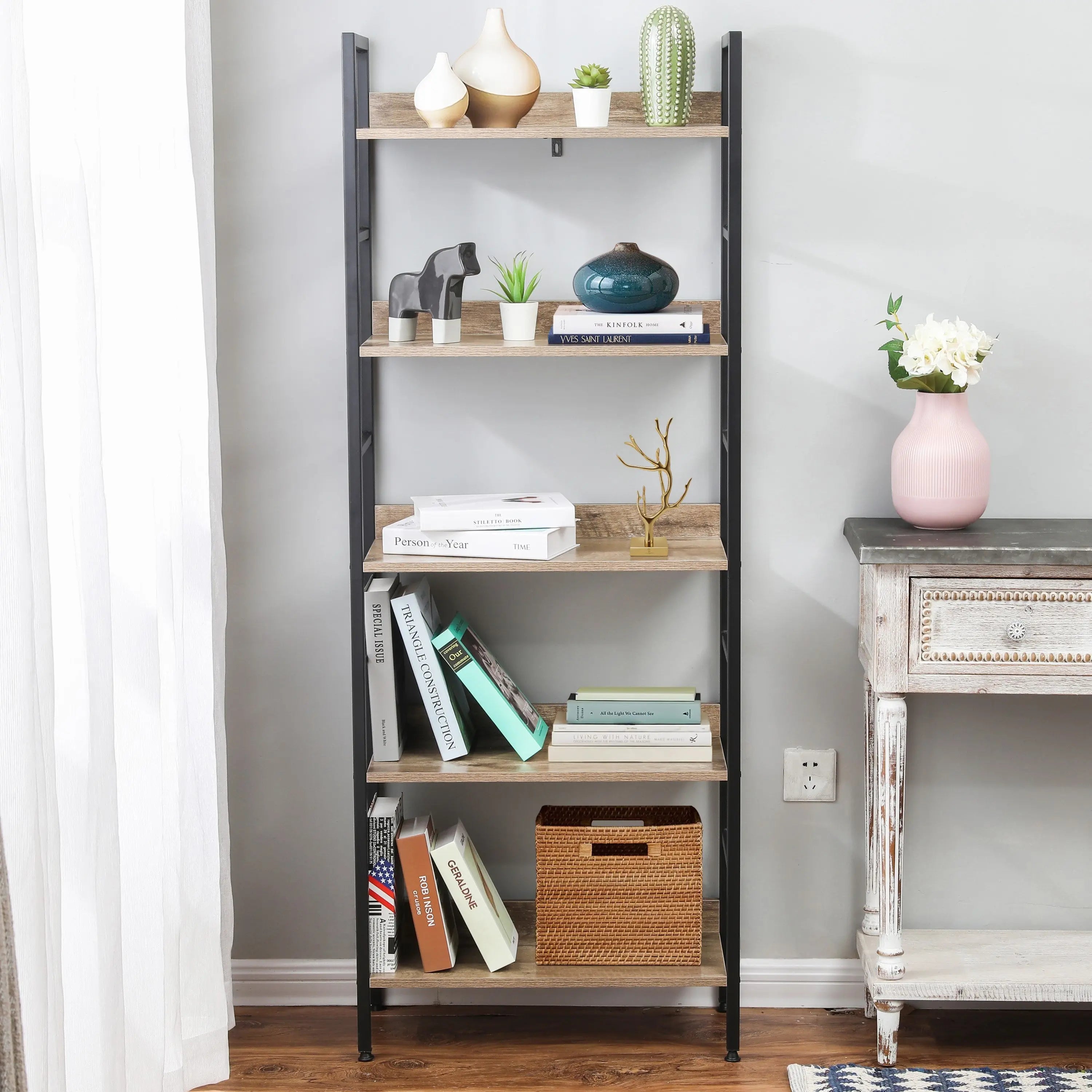 a-bookshelf-with-books-plants-and-decorative-items