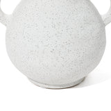 Close-up of a white, speckled ceramic pot with rounded handles, showcasing its textured surface and hinting at a vintage-inspired vase design.