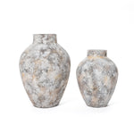Two large, textured ceramic vases with a speckled gray and beige pattern on a white marble-like background, perfect for elevating your home decor.