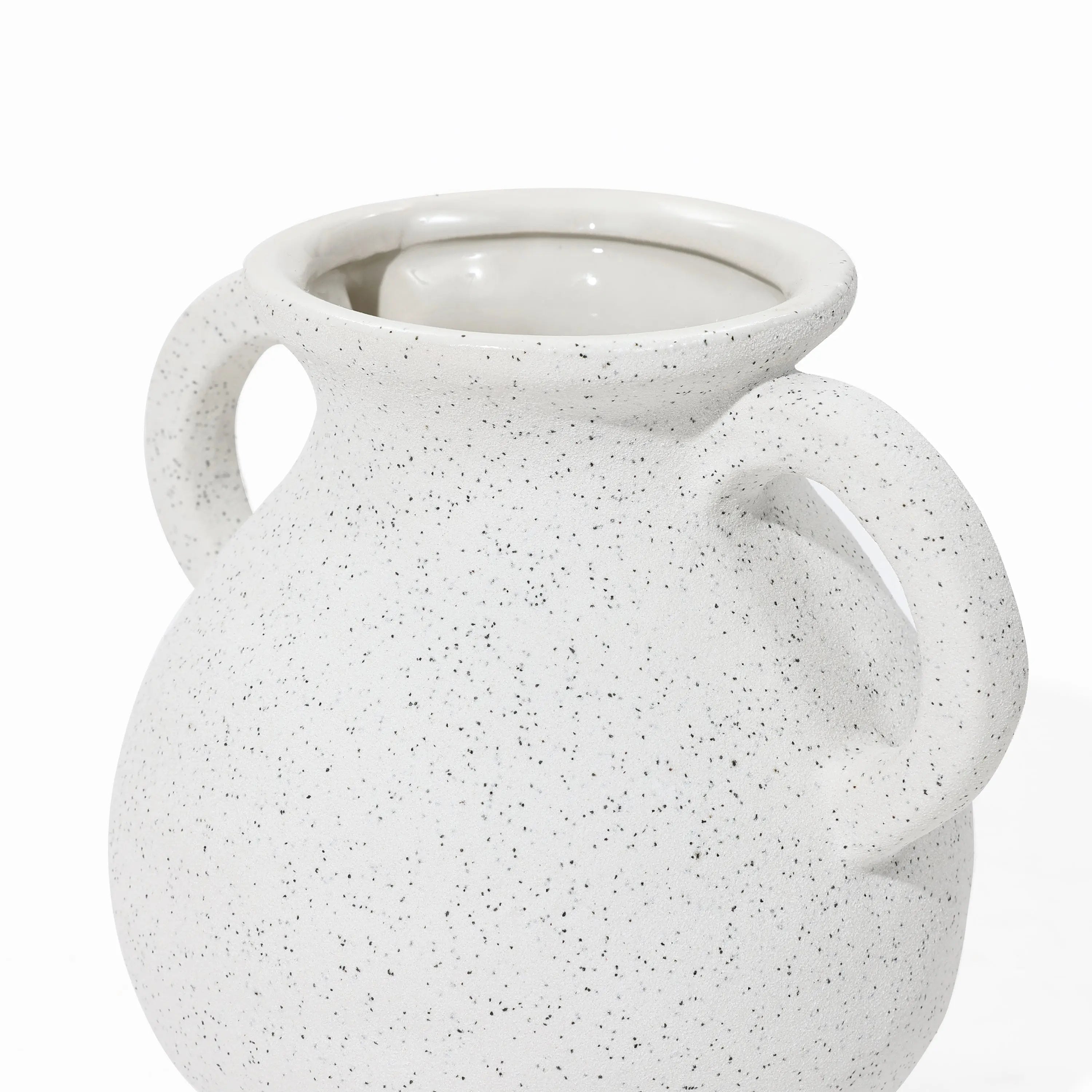 A white speckled ceramic vase with two handles and a wide opening on a plain background, showcasing a vintage-inspired vase aesthetic.