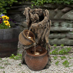 tree-trunk-fountain-and-pots