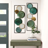 green-console-table-and-a-pair-of-green-and-gold-round-mirrors-hanging-on-the-wall