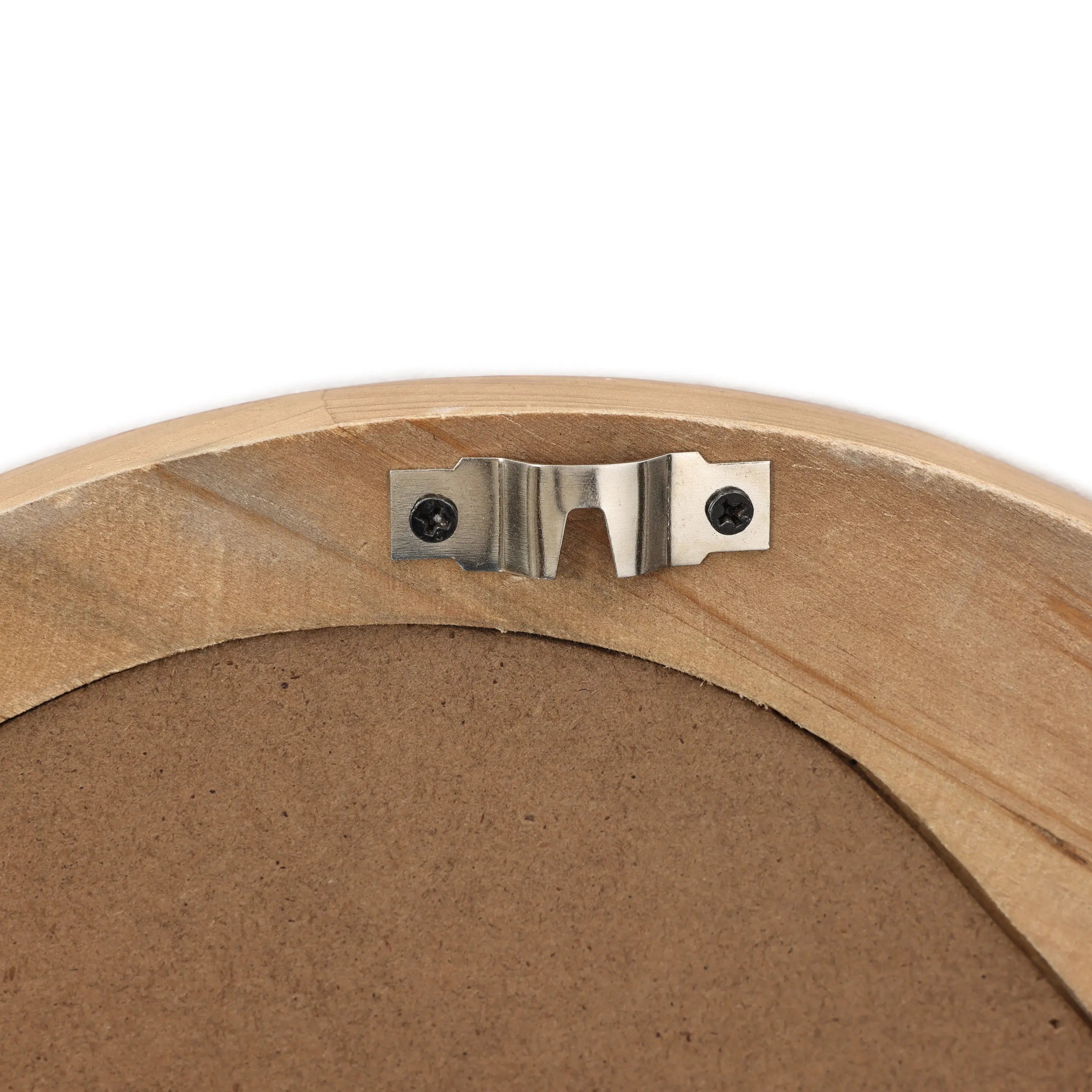 A wall mounting bracket attached to the back of an organic decor pine frame with two screws.